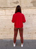 Fuseaux con rose rosse
